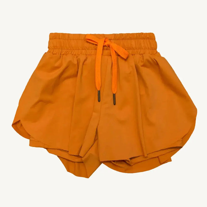 Let your little one flutter through their day in these vibrant Orange Butterfly Shorts! Designed with playful style and comfort in mind, these cheerful shorts feature a fun butterfly theme that sparks imagination and joy. 
