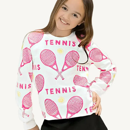 A pink sequin sweatshirt with tennis rackets and balls and a white background.
