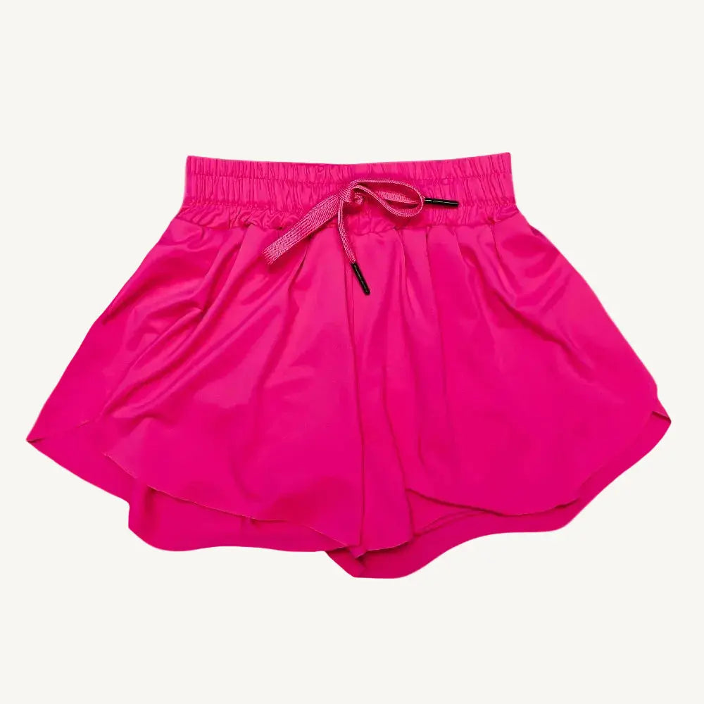 Neon pink butterfly shorts that are comfortable and cute for active yet stylish girls.