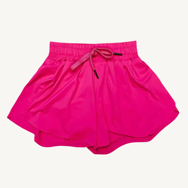 Neon pink butterfly shorts that are comfortable and cute for active yet stylish girls.
