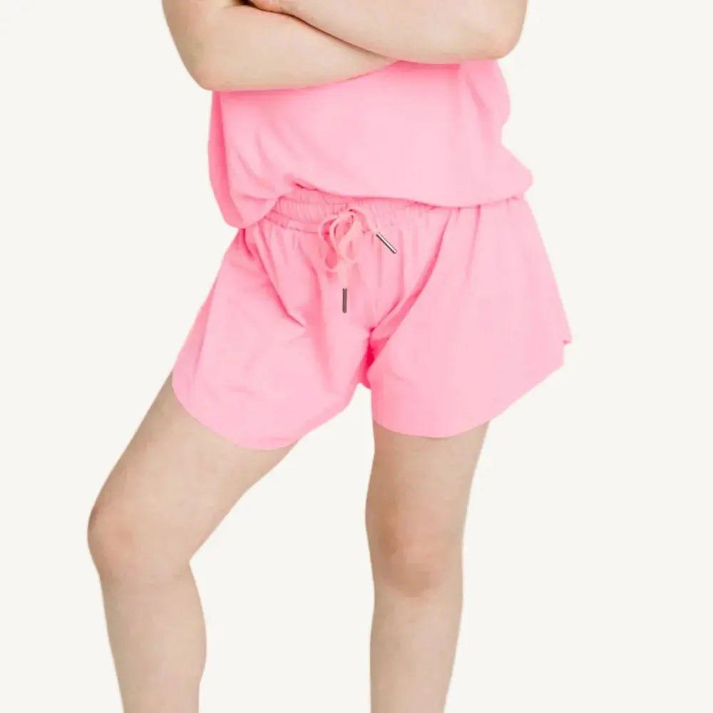 Light pink butterfly shorts that are comfortable and cute for athletic girls.