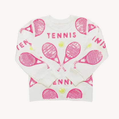 A pink sequin sweatshirt with tennis rackets and balls and a white background.