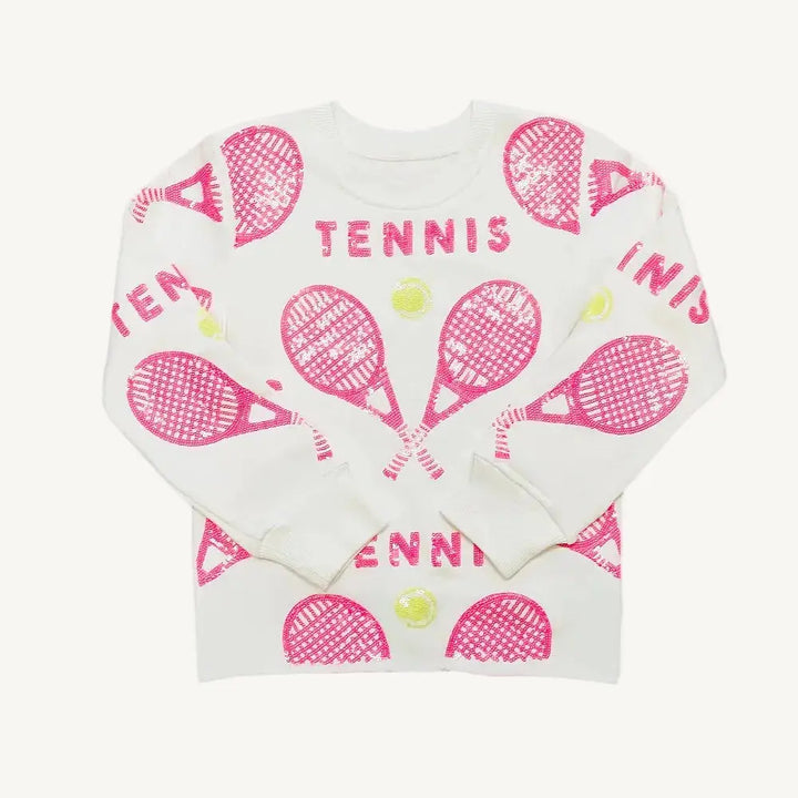A pink sequin sweatshirt with tennis rackets and balls and a white background.