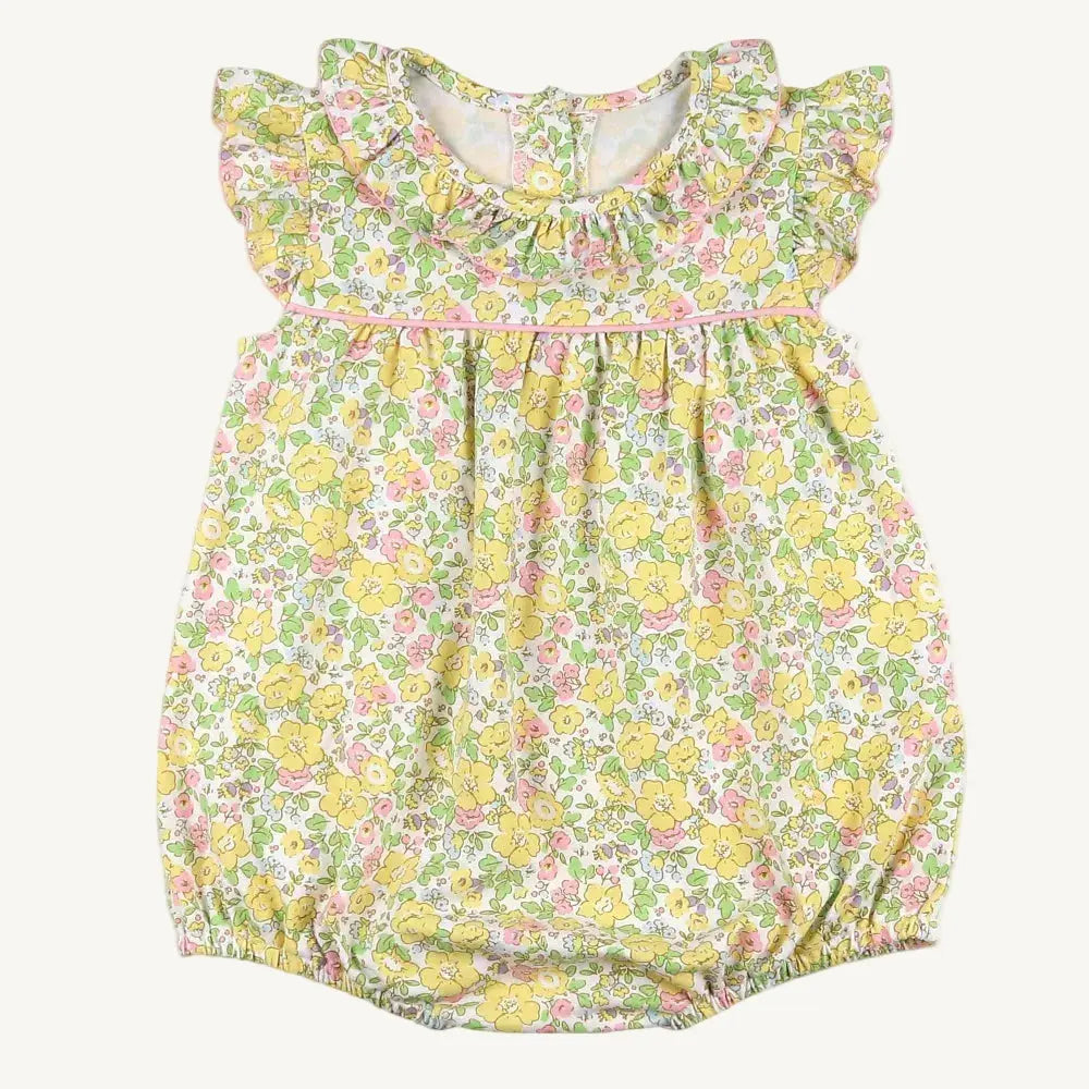 Floral baby romper on a white background