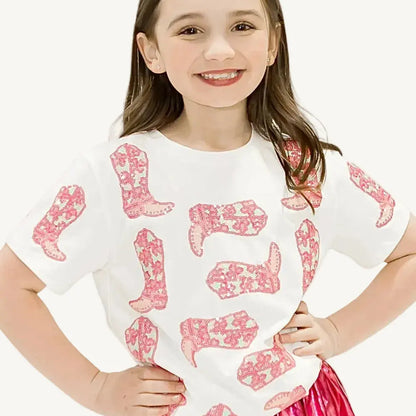 A preppy and pink sequin cowgirl shirt with a white background.